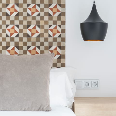 The hydraulic tiles in the master bedroom