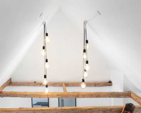 The exposed wooden ceiling beams