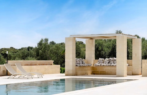 Swim among ancient olive trees with Puglian countryside stretching beyond