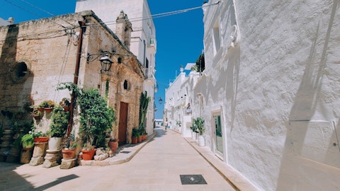 Explore Ostuni, the 'White City' of Puglia, a fifteen-minute drive away