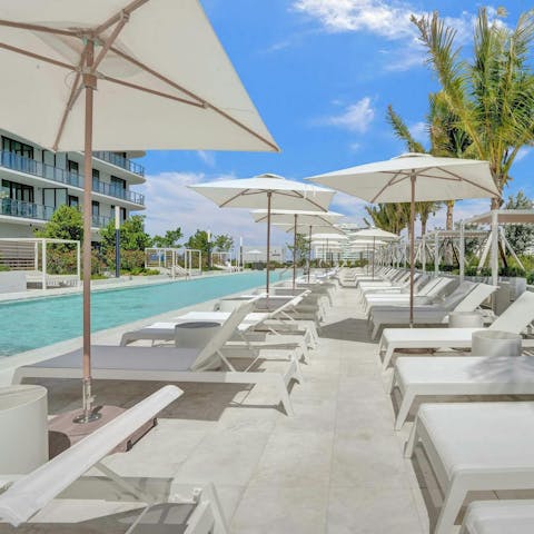 Soak up the Florida sun next to the communal swimming pool