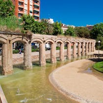 Visit the stone arches at Parc del Clot