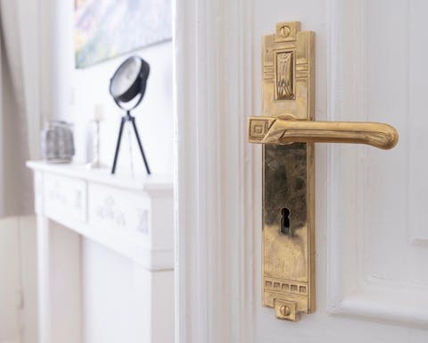 The ornate Art Nouveau door handle