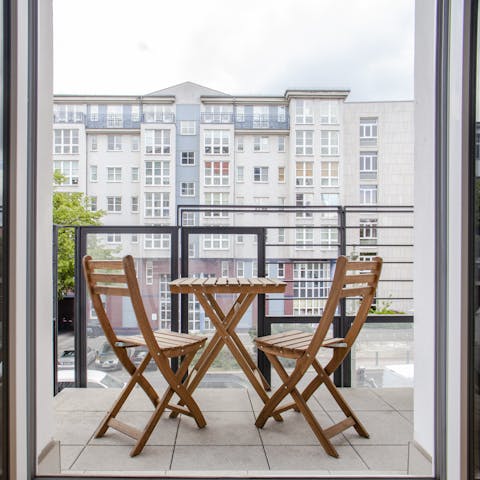 A balcony with street views