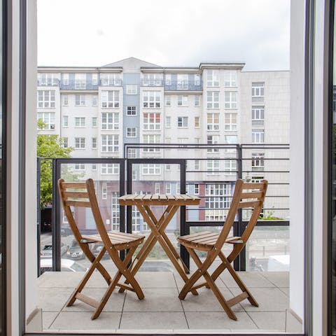 A balcony with street views