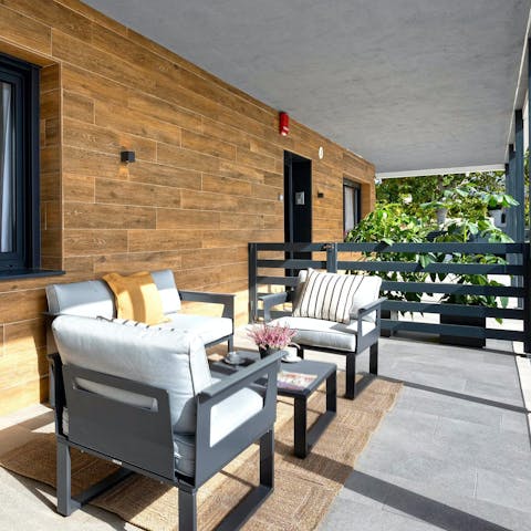 Relax and soak up the sun on one of the two private terraces