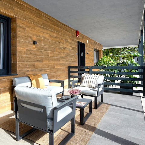 Relax and soak up the sun on one of the two private terraces