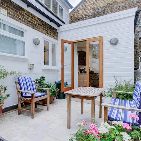 Relax and enjoy a glass of wine out on the private roof terrace