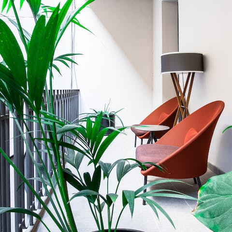 Sit out on the balcony with a glass of Spanish wine