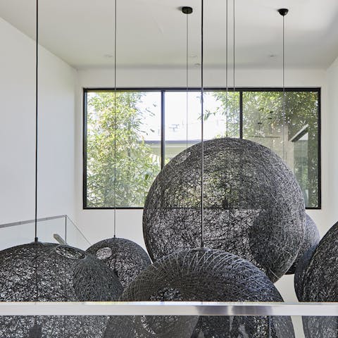 Statement orbital light fixture