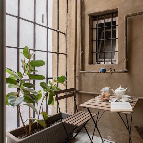 Pour a coffee and enjoy some fresh air on the balcony