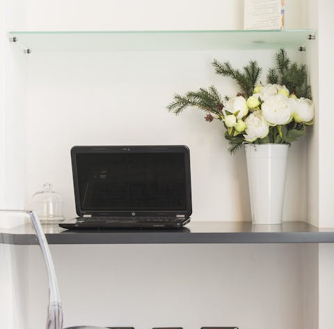 Work remotely at the dedicated desk
