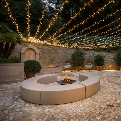 Relax around the courtyard's fire pit under the twinkle lights