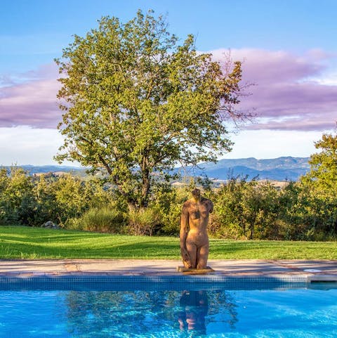 Drift in the swimming pool and look out at the rolling hills