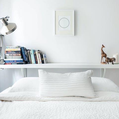 Make use of the convenient bedside lamp for nighttime reading