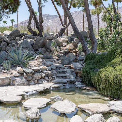 Dip your toes in the river that runs through the property