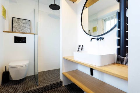 Feel anew in the sleek, modern bathroom