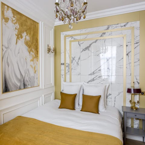 Get some rest in the elegant bedrooms after visiting Galeries Lafayettes