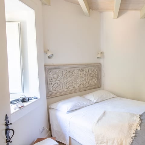 This hard-carved headboard