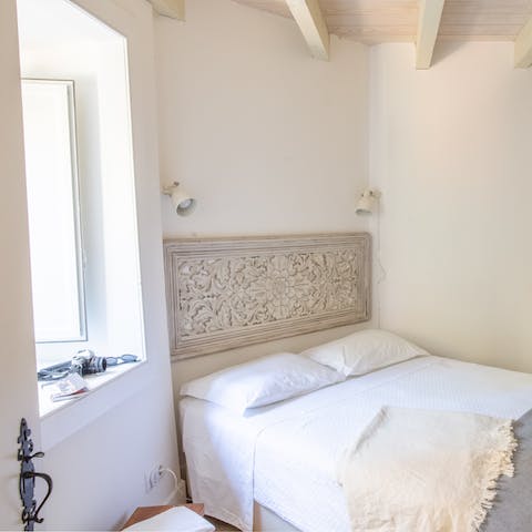 This hard-carved headboard