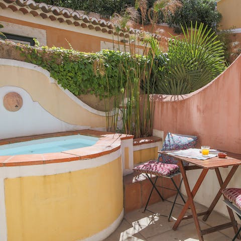 Enjoy morning coffee on the traditional paved terrace