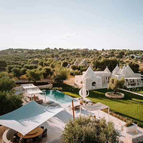 Spend blissful days relaxing by the private heated pool