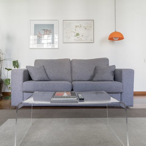Unwind in the stylish living area after a long day exploring Barcelona