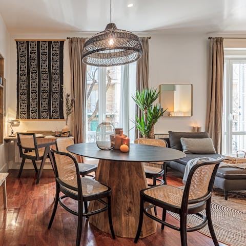 Gather together for a celebratory meal while enjoying the breeze coming through the French doors