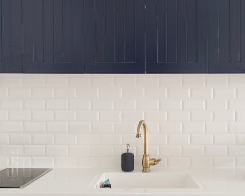 Sleek metro tiling in the kitchen