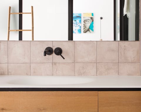 The mid-century-style bathroom furnishings