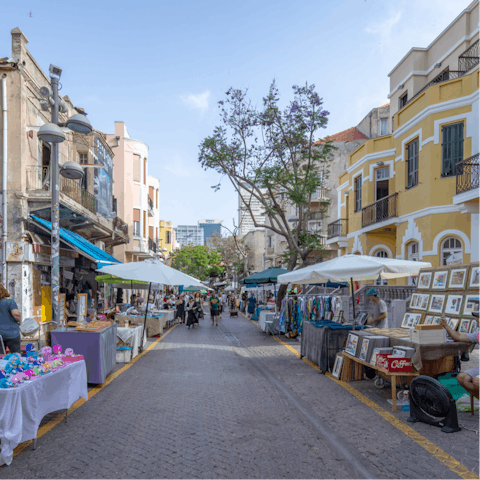 Stroll through the Nachalat Binyamin market, taking in the wonderful arts and crafts