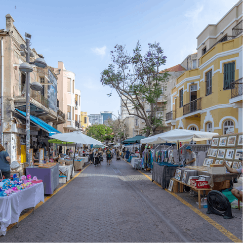 Stroll through the Nachalat Binyamin market, taking in the wonderful arts and crafts