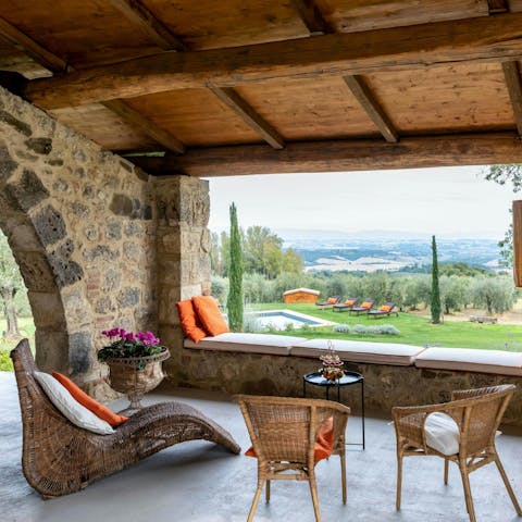 Admire the rolling landscape on the horizon from the covered veranda