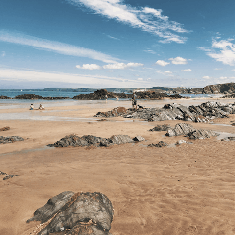 Enjoy swimming and surfing at Newquay Beach, a nine-minute walk away