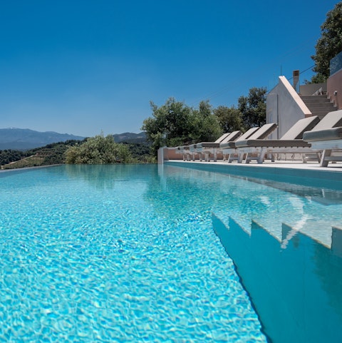 Cool off in the crystalline waters of the infinity pool