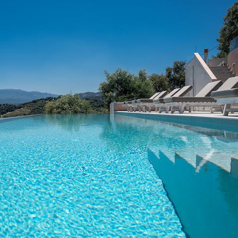 Cool off in the crystalline waters of the infinity pool