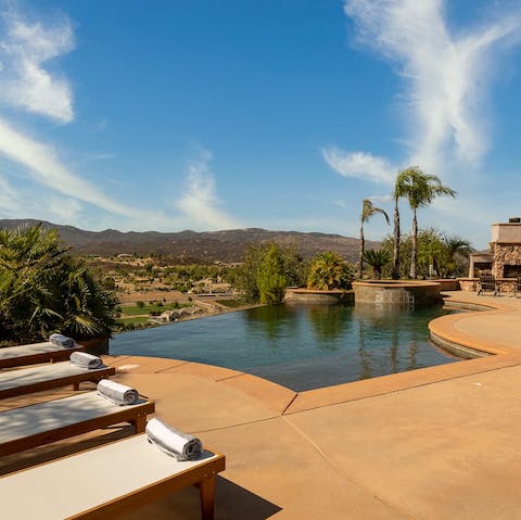Slip into your swimwear and float gracefully about in the infinity pool