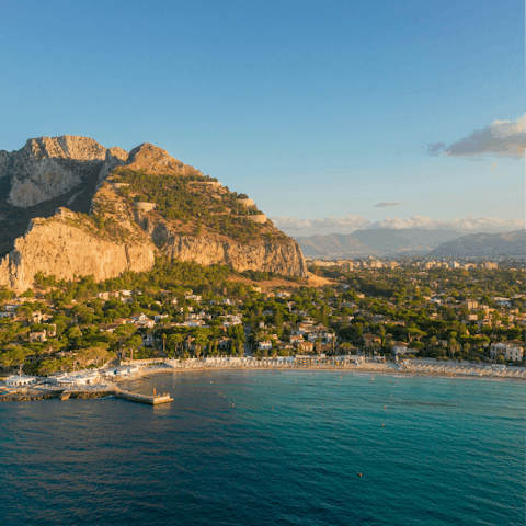 Spend a day at the stunning Spiaggia di Mondello , just a ten minute drive up the coast