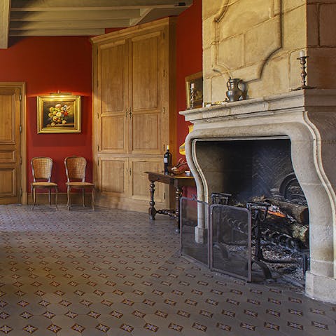 Relax in the glow of roaring fires