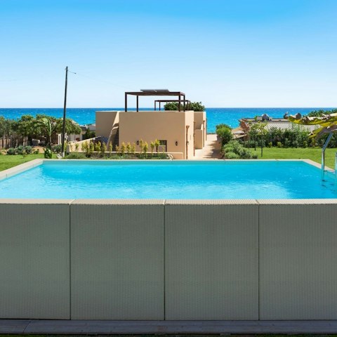 Enjoy refreshing swims in the private pool or walk to the beach