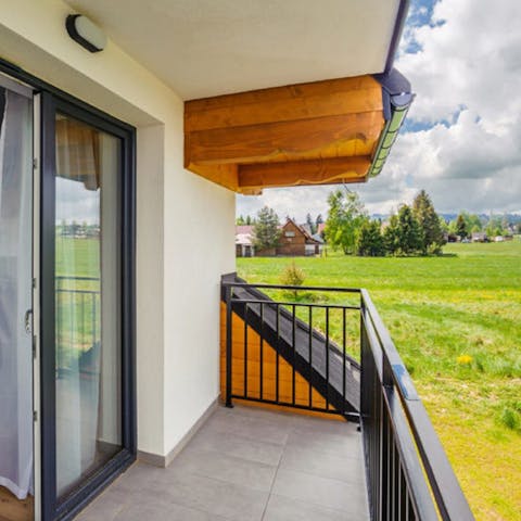 Relax in the tranquil setting and take in the views from your balcony