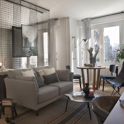 Recline on the plump sofa with a glass of Beaujolais Nouveau