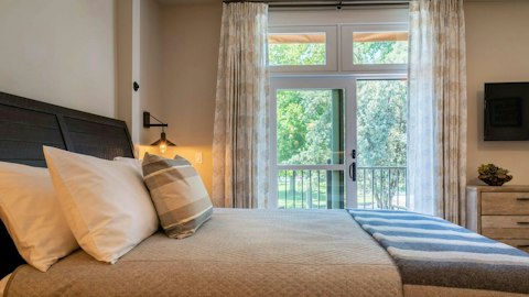 Wake to leafy park views from the bedroom