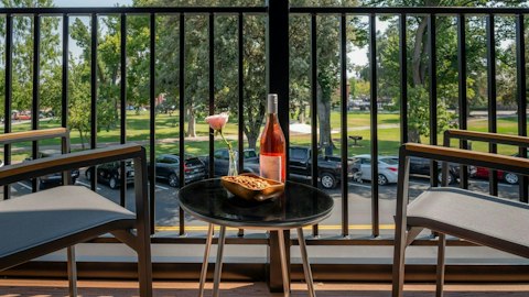 Sip local wine looking out across the park