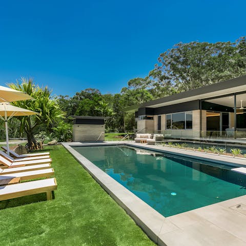 Soak up some sun by the swimming pool