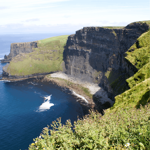 Explore the rolling countryside and craggy Atlantic coastline of County Clare