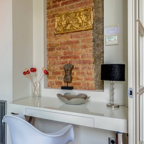 Work remotely from the designated desk space