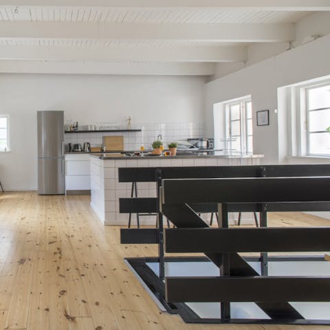 Socialise as a group in the bright and open communal space on the top floor