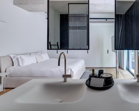 Open bathrooms in some of the bedrooms