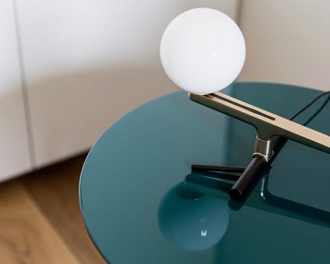 The sculptural frosted glass reading lights